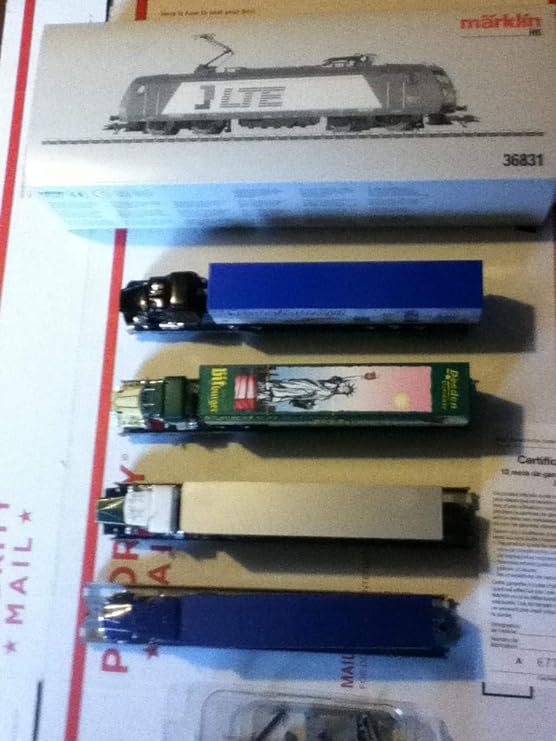 Marklin MARKLIN-HERPA HO Train Set LTE 36831 Digital DB Cast-Metal Electric BR-185 Locomotive W/4 Metal Depressed 8-AXELS Cars W/Assorted Scania-Trucks W/Trailers