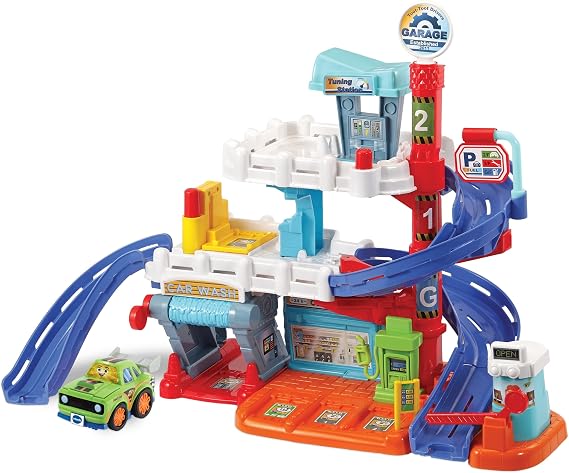VTech Toot-Toot Drivers Fix & Fuel Garage, Car Tracks for Kids with Lights and Sounds, Musical Toy, Suitable for Boys & Girls 12 Months, 2, 3, 4 + Years, English Version | Three-level garage with stock car, tuning station, shop, car wash and fuel station for vehicle role-play. Ages 1-5